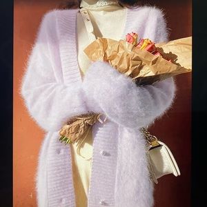 Beautiful elegant and warm one-size Cardigan.